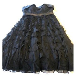 Tea length, strapless, black dress